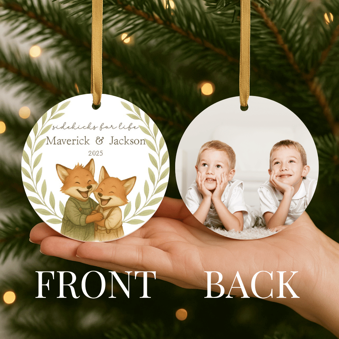 Personalized ceramic Christmas ornament with hugging foxes on one side and a photo on the back, for brothers or young boys