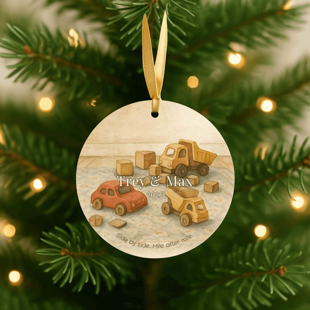Personalized ceramic Christmas ornament with a cars and trucks, for brothers or young boys, hanging in a Christmas tree