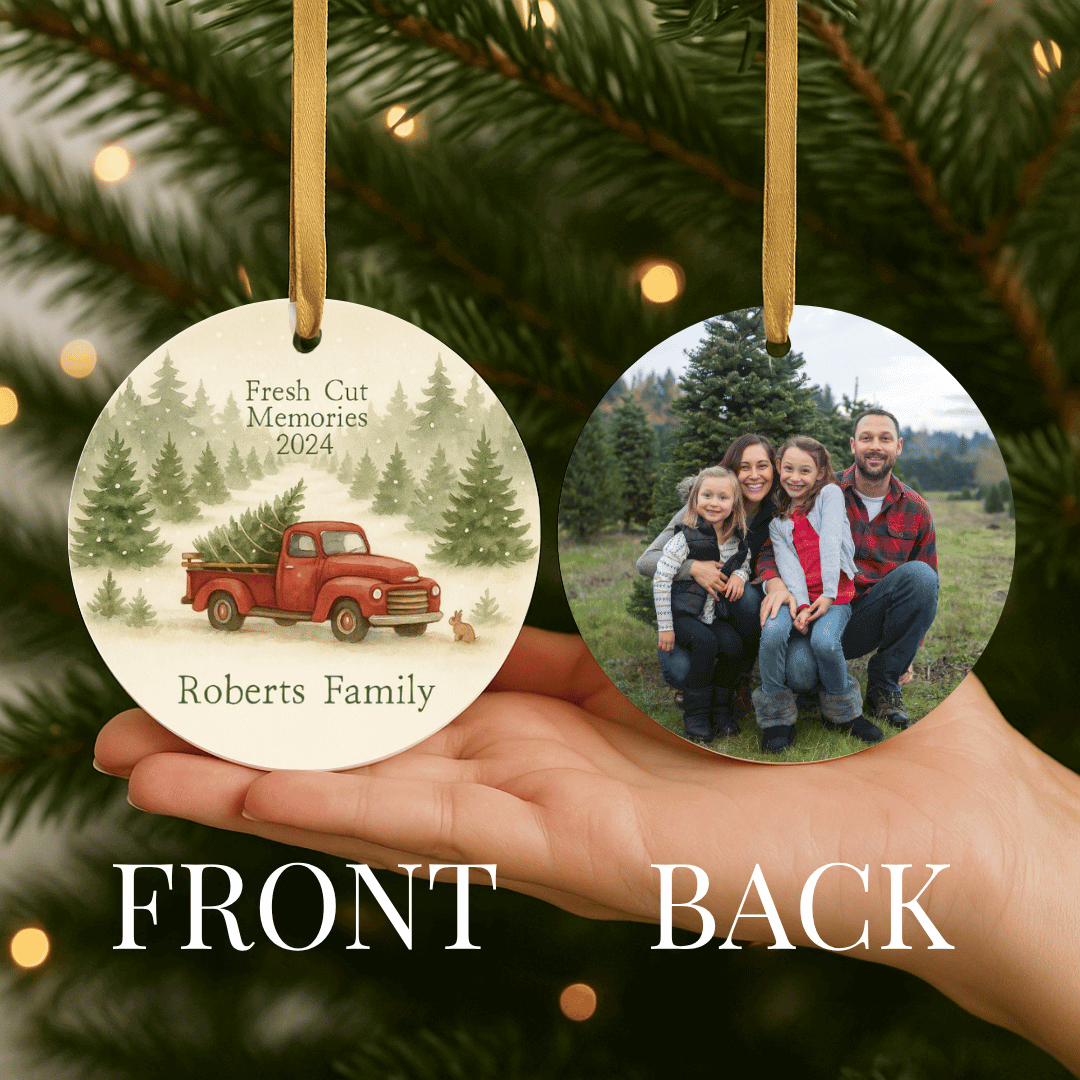 Round personalized Christmas tree farm ornament with red truck and trees, showing the front and a photo on the back
