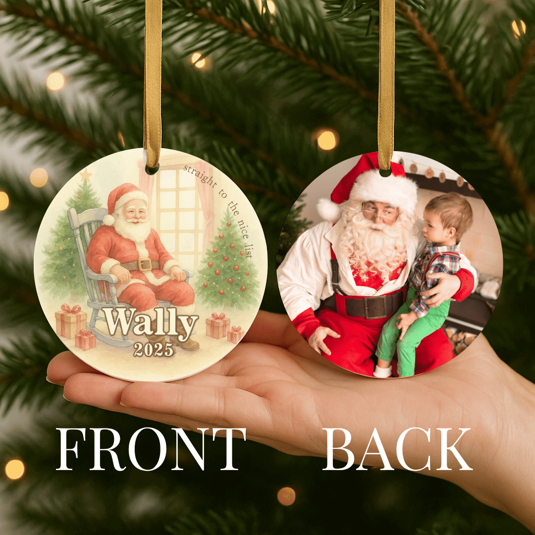 Christmas ornament showing the front with Santa Claus and personalization and the back with a photo, held against a Christmas tree background.