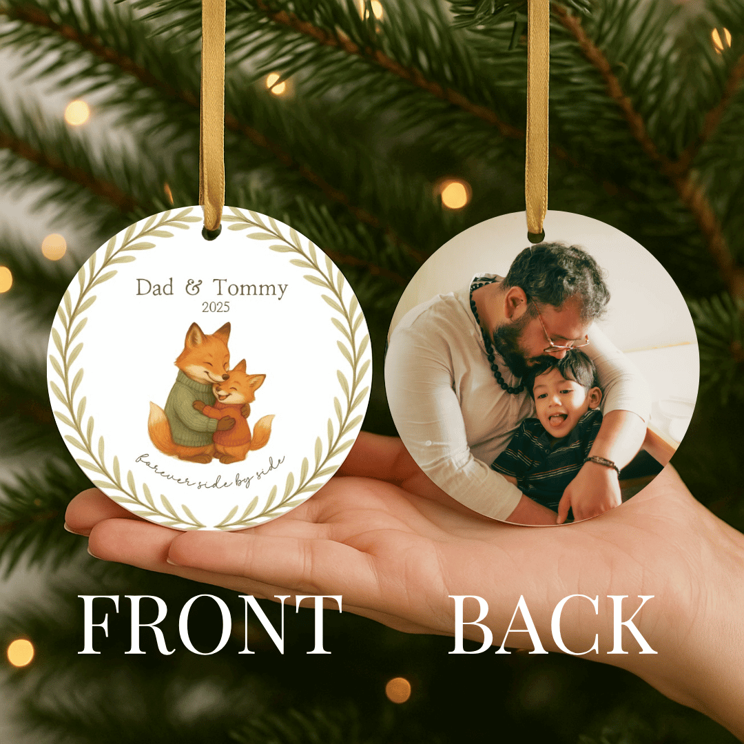 Personalized ceramic Christmas ornament with hugging foxes on one side and a photo on the back, for dad and child