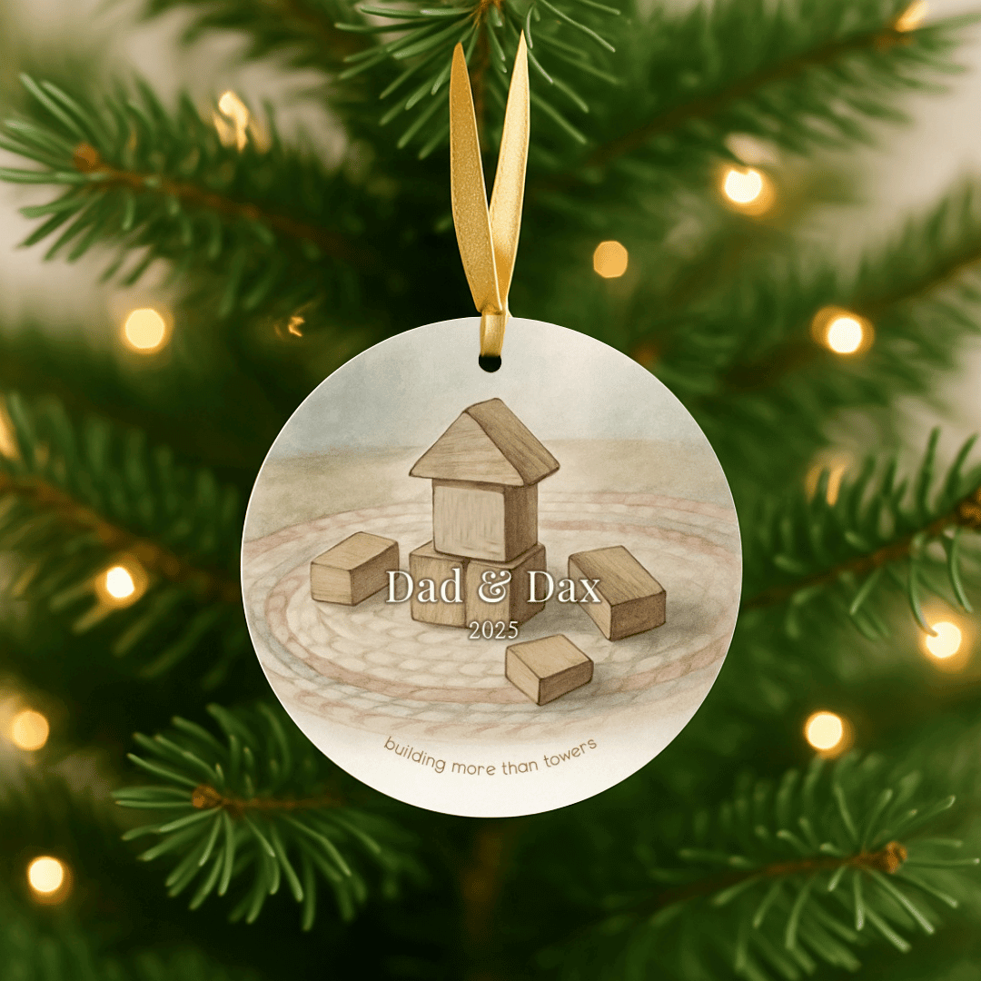 Personalized ceramic Christmas ornament with building blocks for dad and child, hanging on a tree