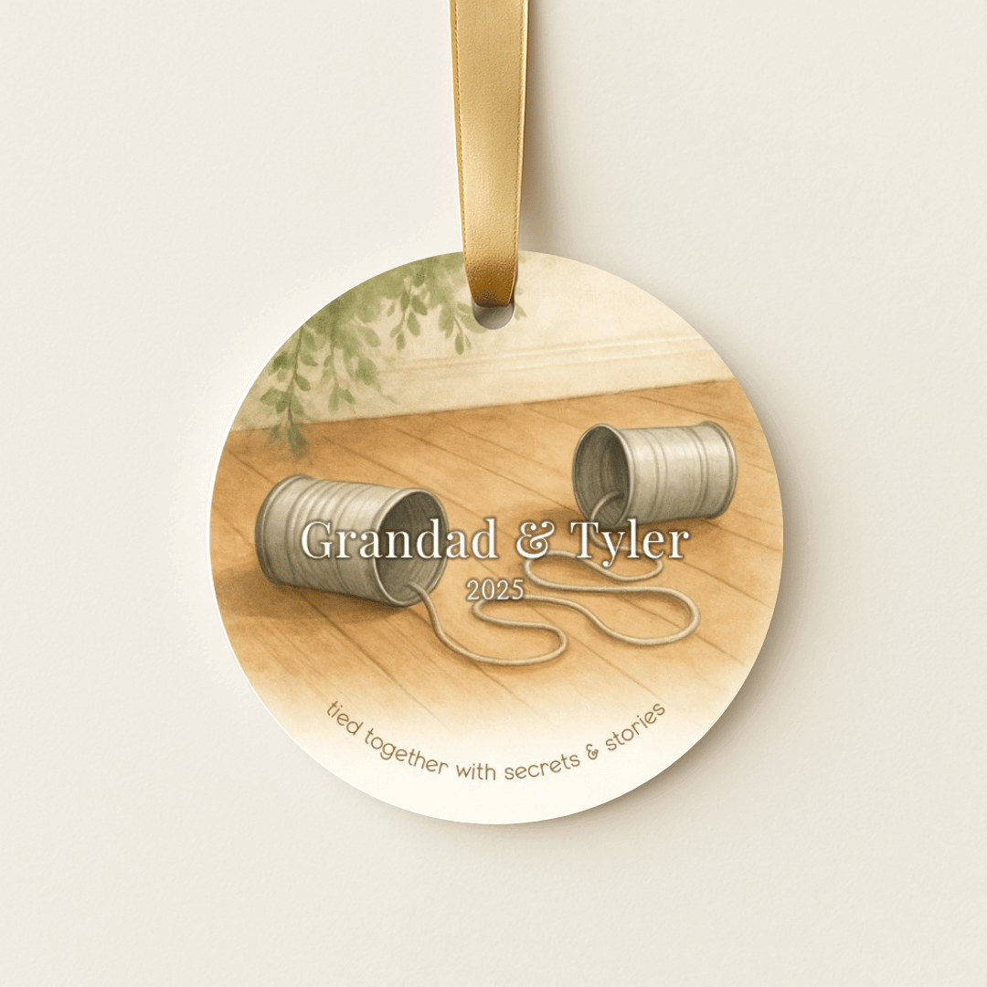 Personalized ceramic Christmas ornament with tin can phones for grandpa and a grandchild