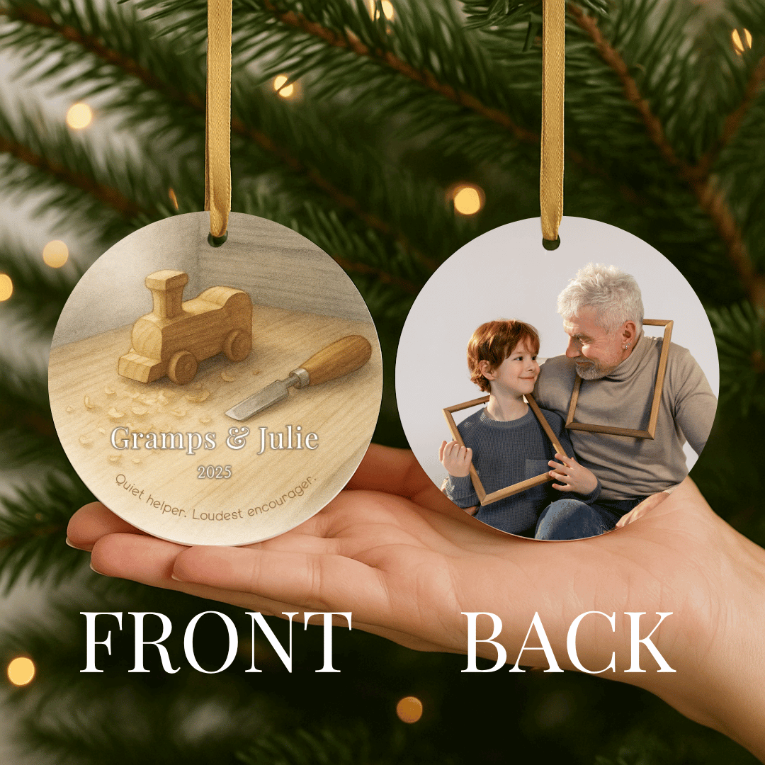 Personalized ceramic Christmas ornament with a toy wooden train and chisel on one side, and a photo on the other, for grandpa and a grandchild