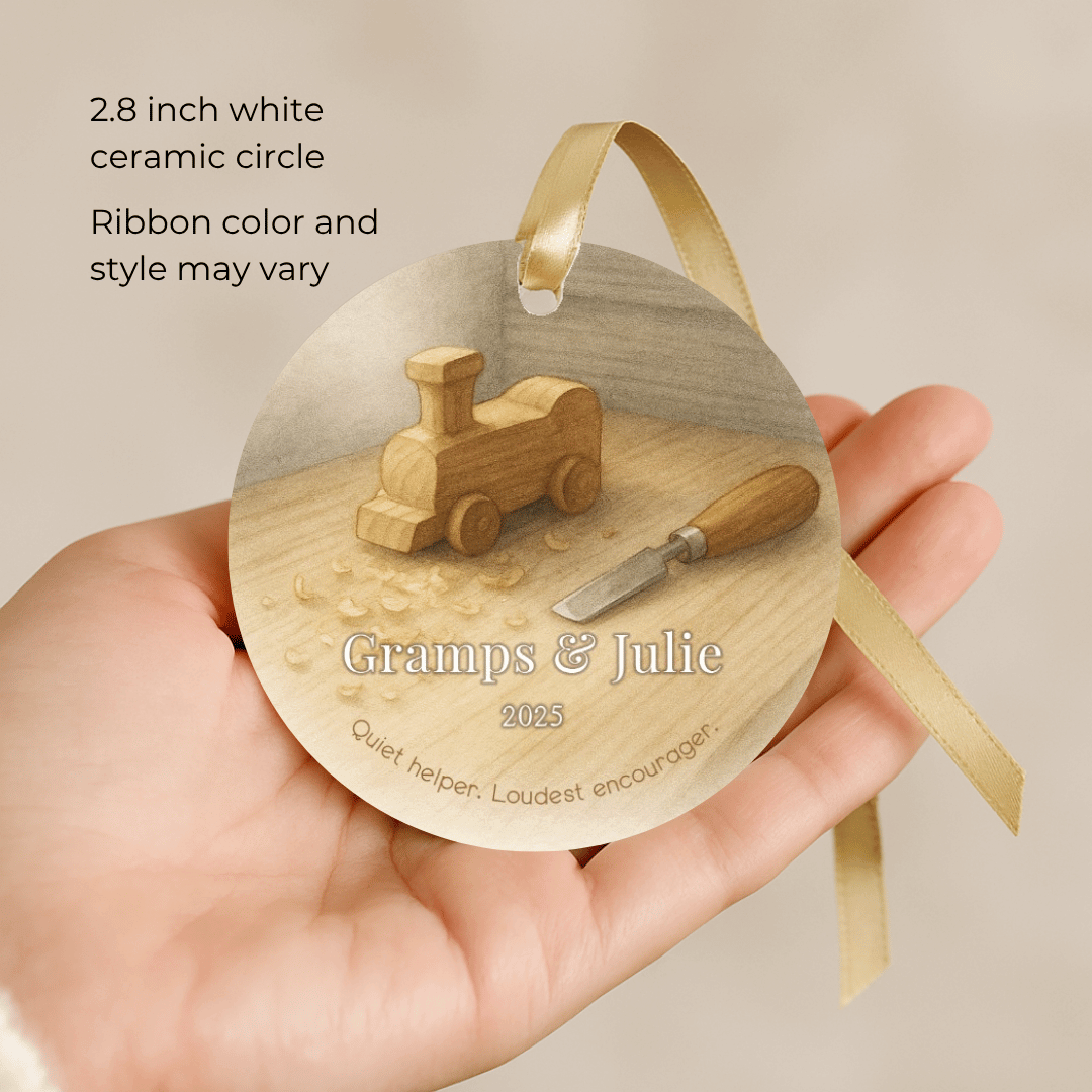 Personalized ceramic Christmas ornament with a toy wooden train and chisel for grandpa and a grandchild