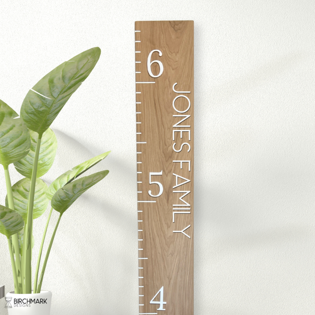 Wooden growth chart with personalization and inch marks in white