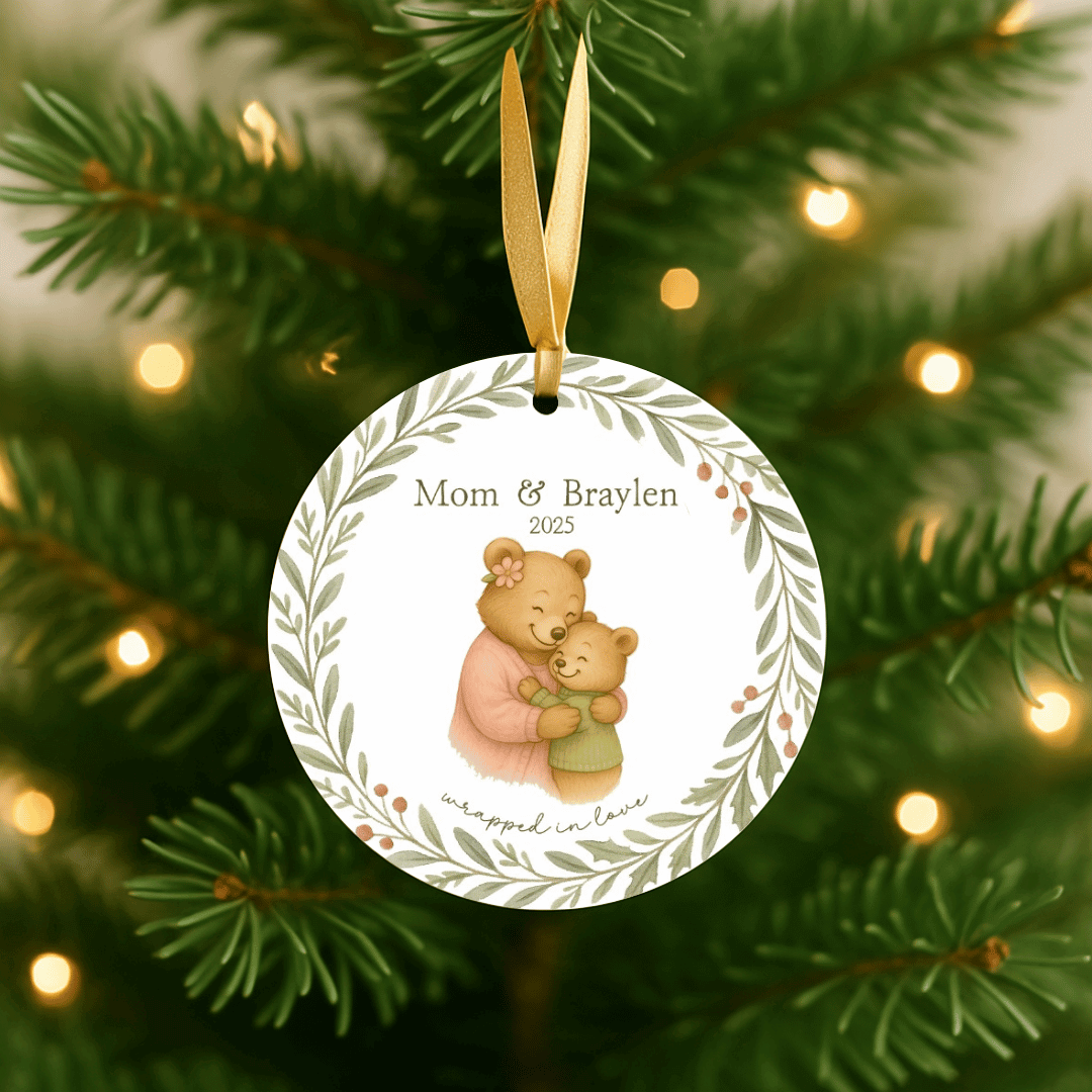 Personalized ceramic Christmas ornament with hugging bears, for moms and a child, hanging on a Christmas tree