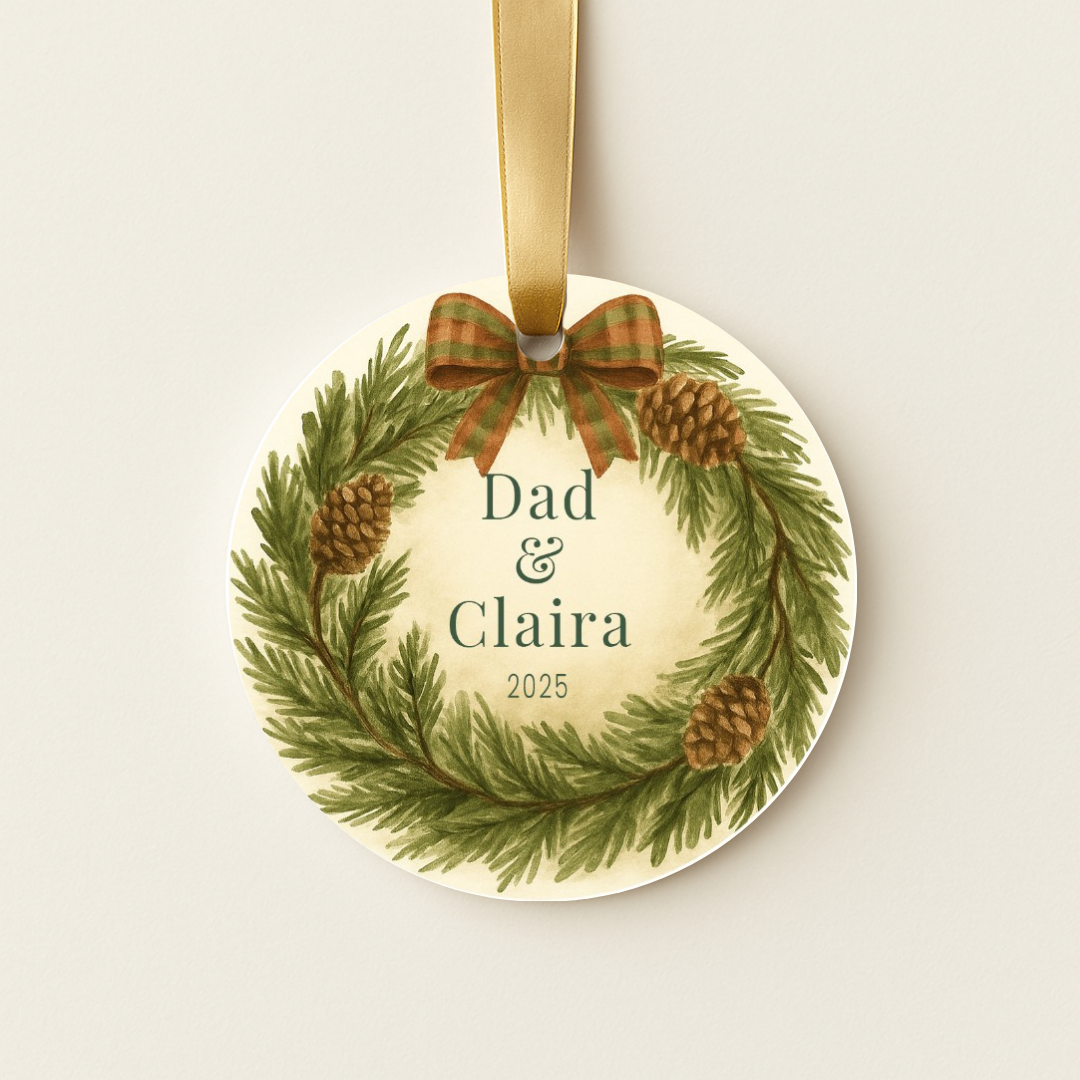 Personalized Christmas ornament with a pine wreath and plaid bow
