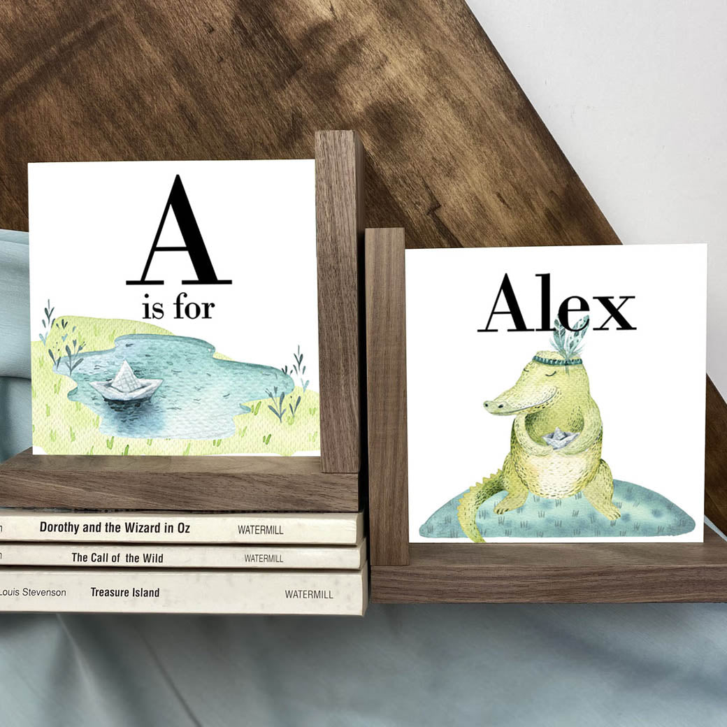 L shaped bookends with alligator and small puddle
