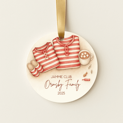 Round personalized ceramic Christmas ornament with matching red and white striped family pajamas