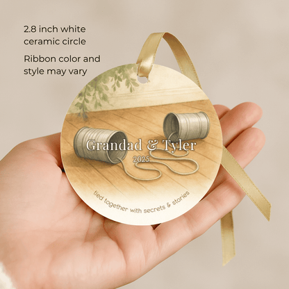 Personalized ceramic Christmas ornament with tin can phones for grandpa and a grandchild