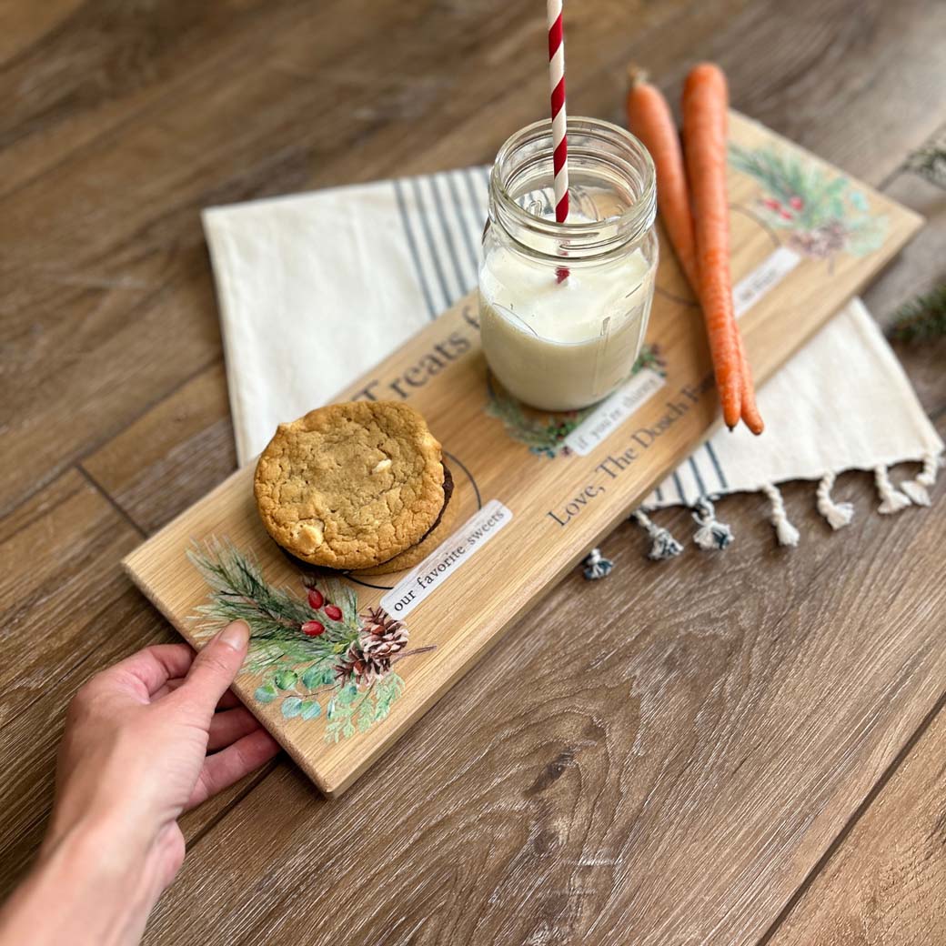 Personalized festive santa cookie tray getting picked up