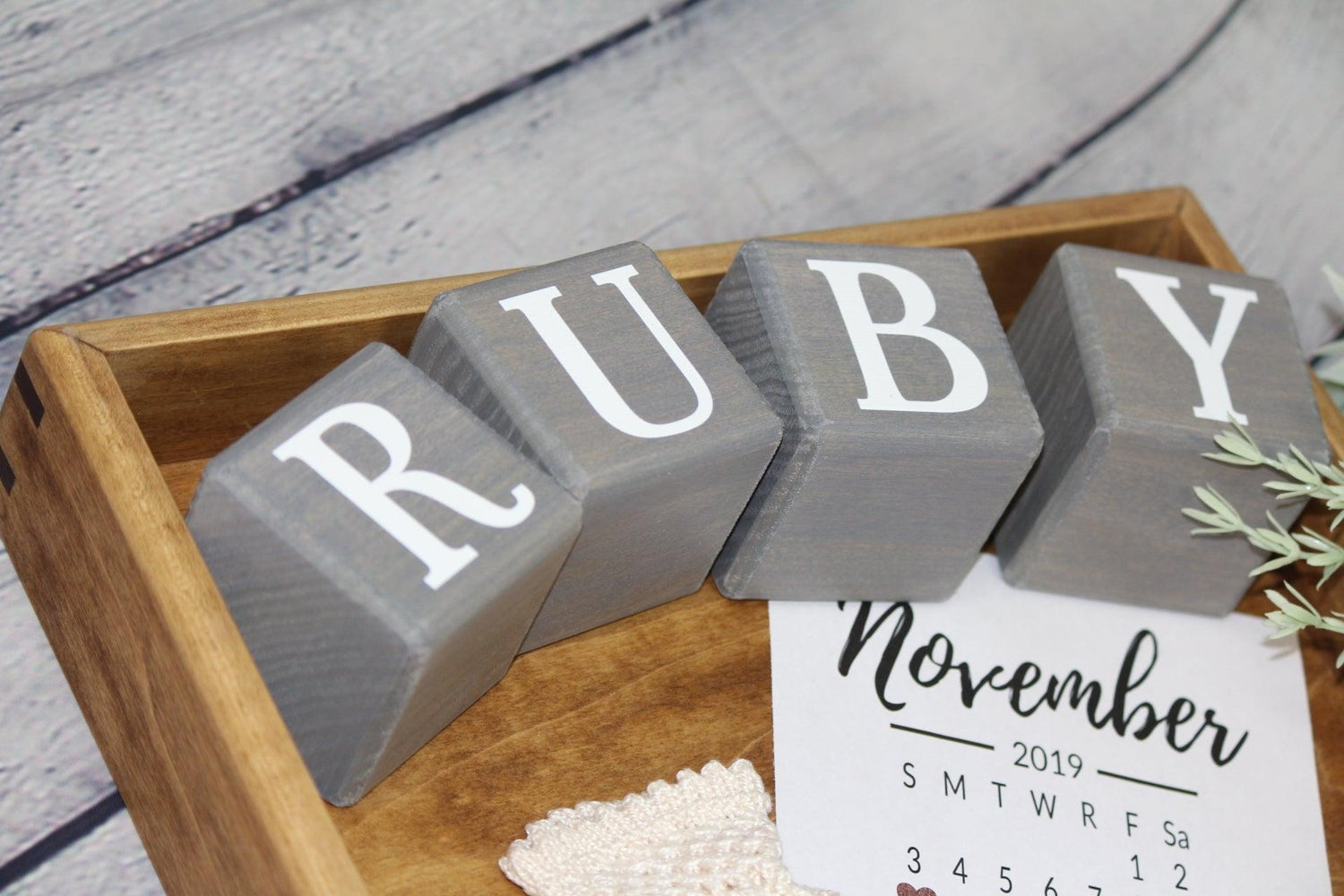 Wooden letter blocks in gray stain for Ruby