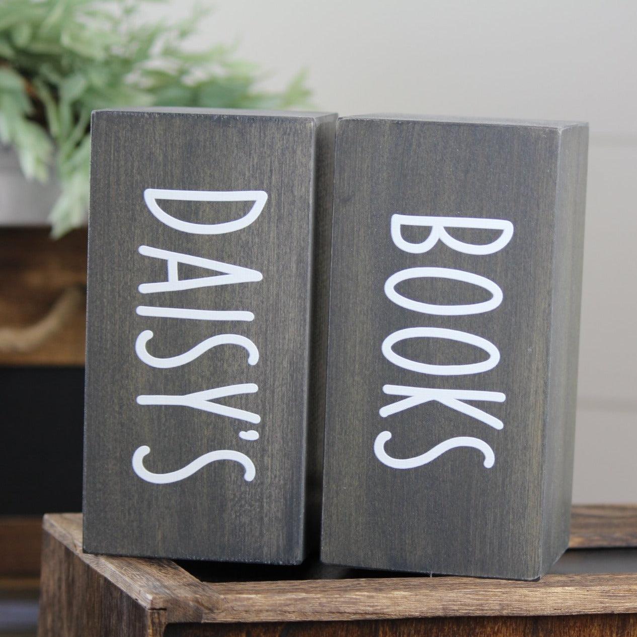 Pair of personalized wooden rectangular bookends in walnut