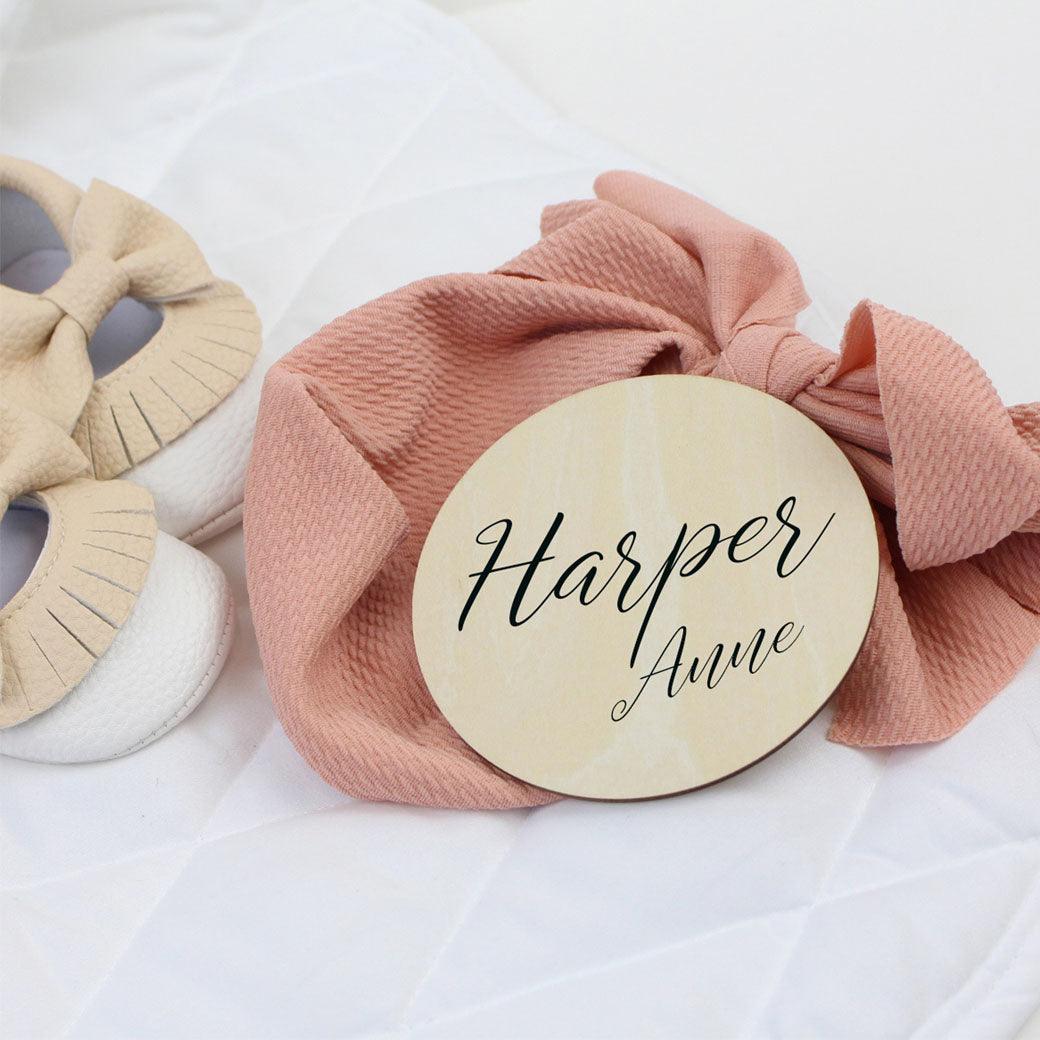 Personalized round wooden name announcement sign