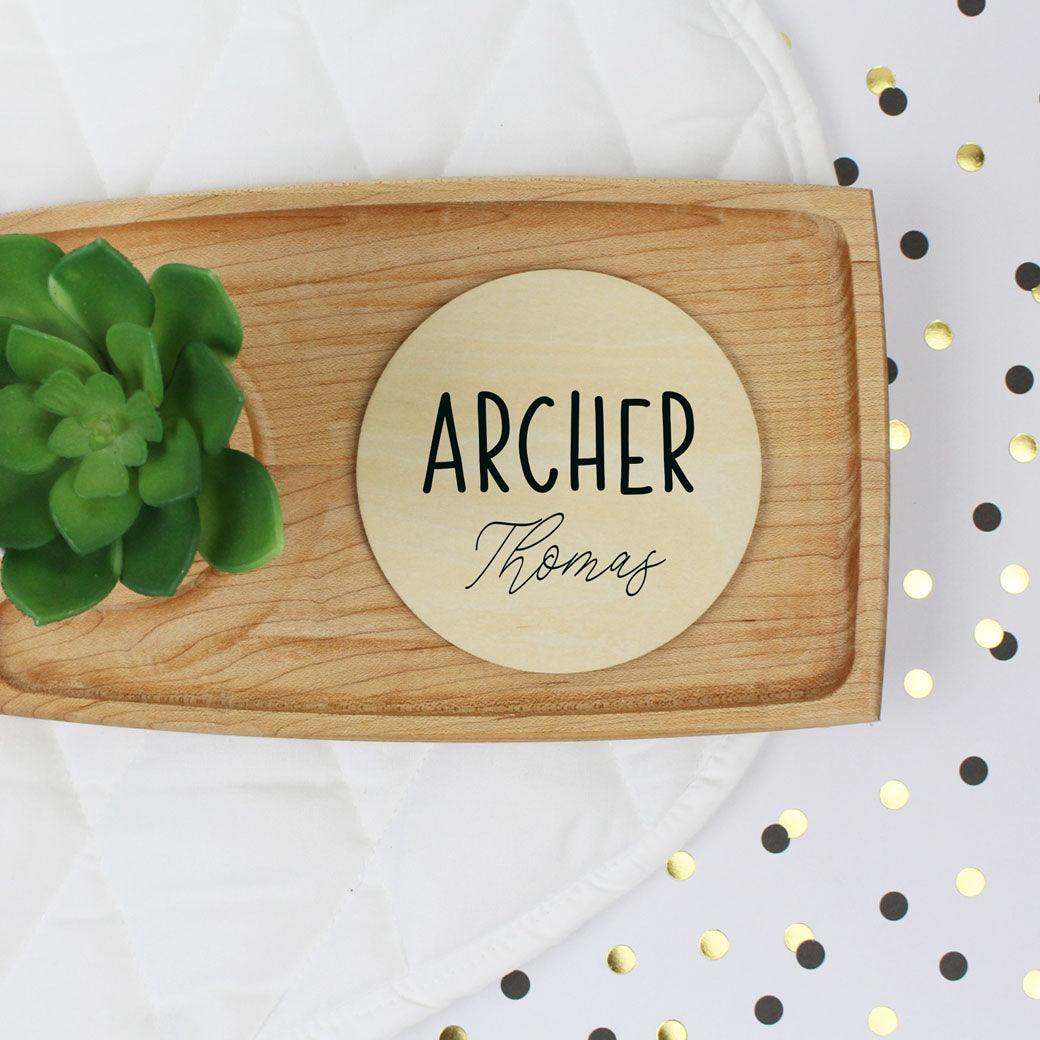 Personalized round wooden name announcement sign