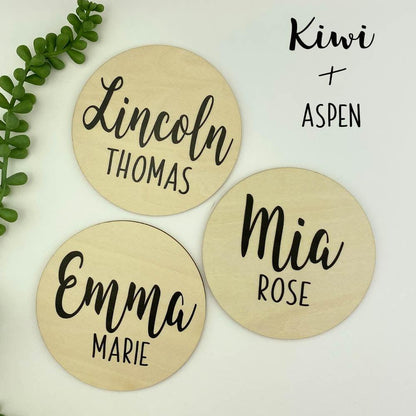 Personalized round wooden name announcement sign