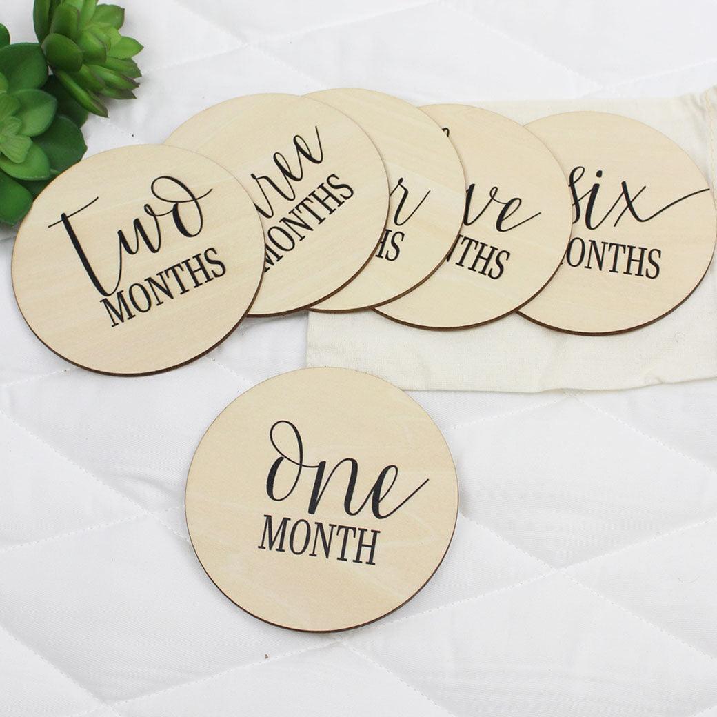 Simple baby monthly milestone cards showing 1 to 6 months