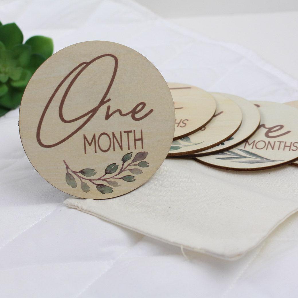 Baby milestone cards showing 1 month