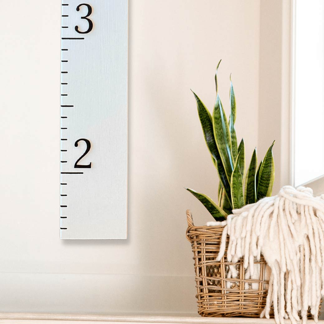 white and black growth chart ruler for kids